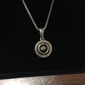 Diamond in rhythm two tone necklace from Kays.